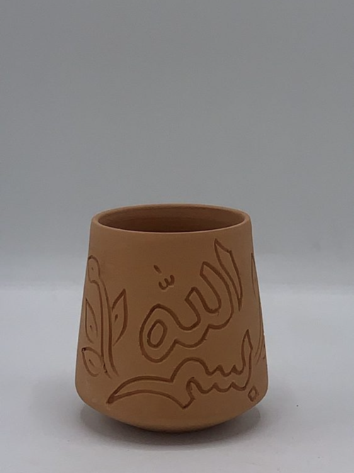 Pottery clay water cup with hand